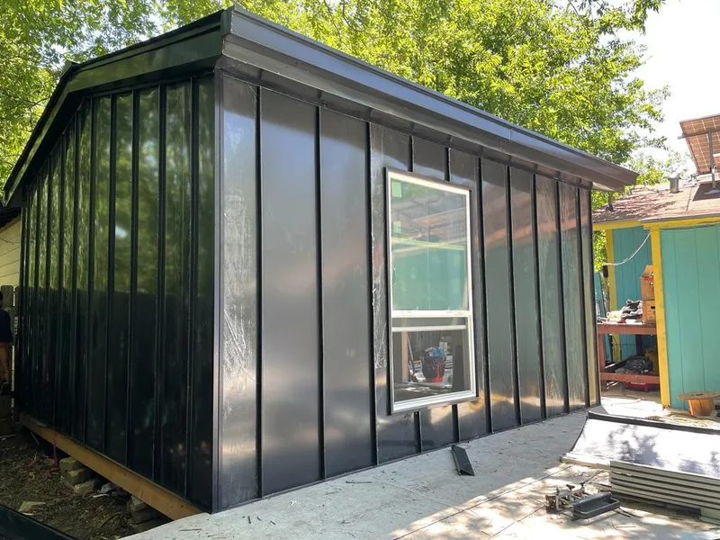 Black standing seam metal wall panels for Roof Inspection in Lahaina
